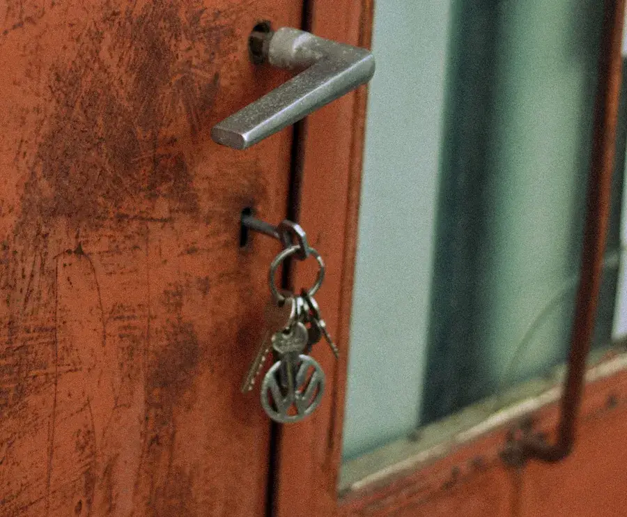 Keys hanging from the lock of an old door – why keys snap and when broken key removal Normanton is needed, Locksmith Normanton