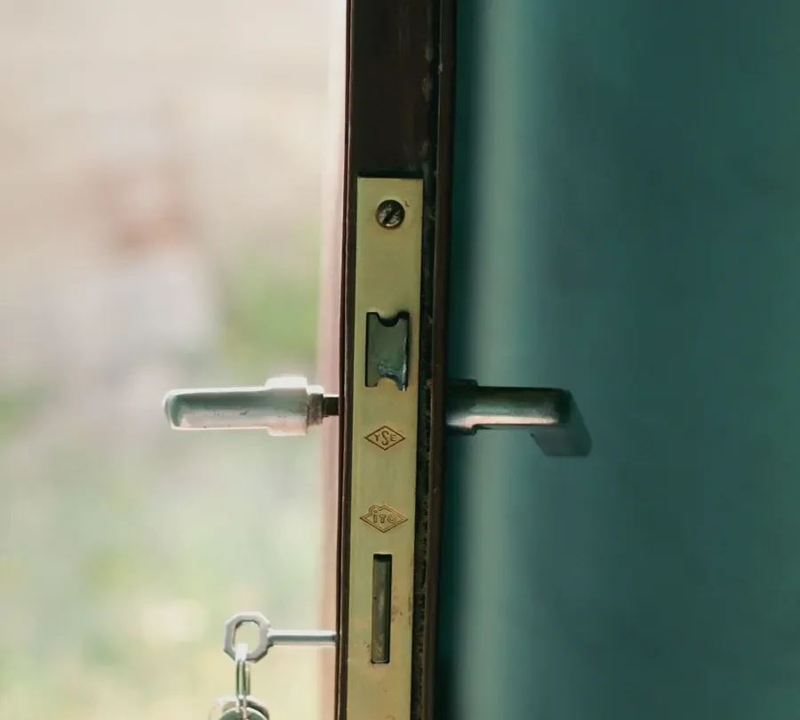 Door edge with a lock faceplate, lever handles and key – checking the multipoint mechanism before you change a uPVC door lock in Normanton, Locksmith Normanton guide