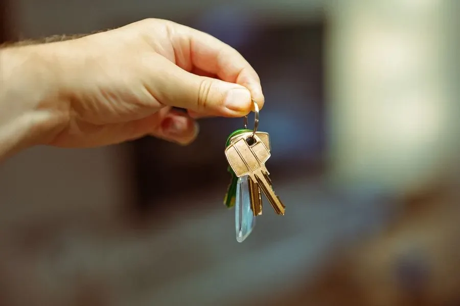 Hand holding a set of house keys – residential locksmith Normanton help for landlords and letting agents from Locksmith Normanton